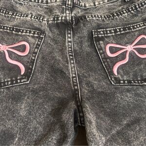 Stylish Black Boot Cut Jeans with Pink Bow Accents